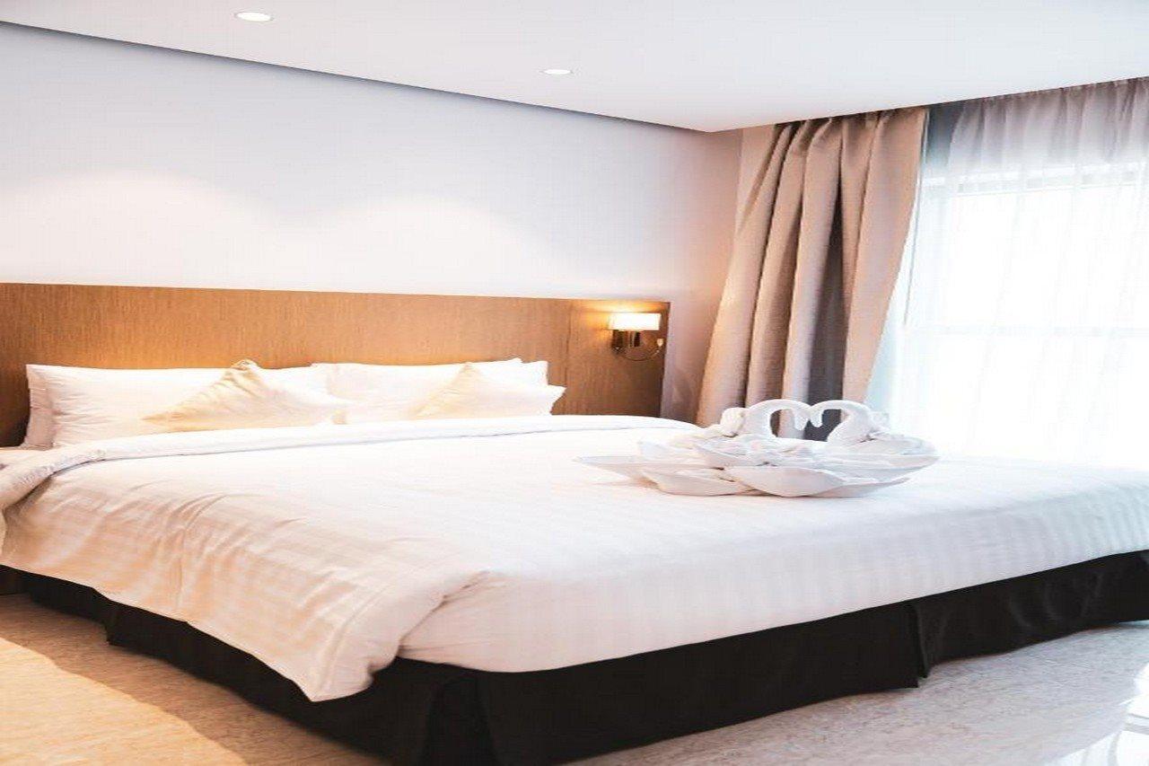 He Hotel Apartments 두바이 외부 사진 A bed